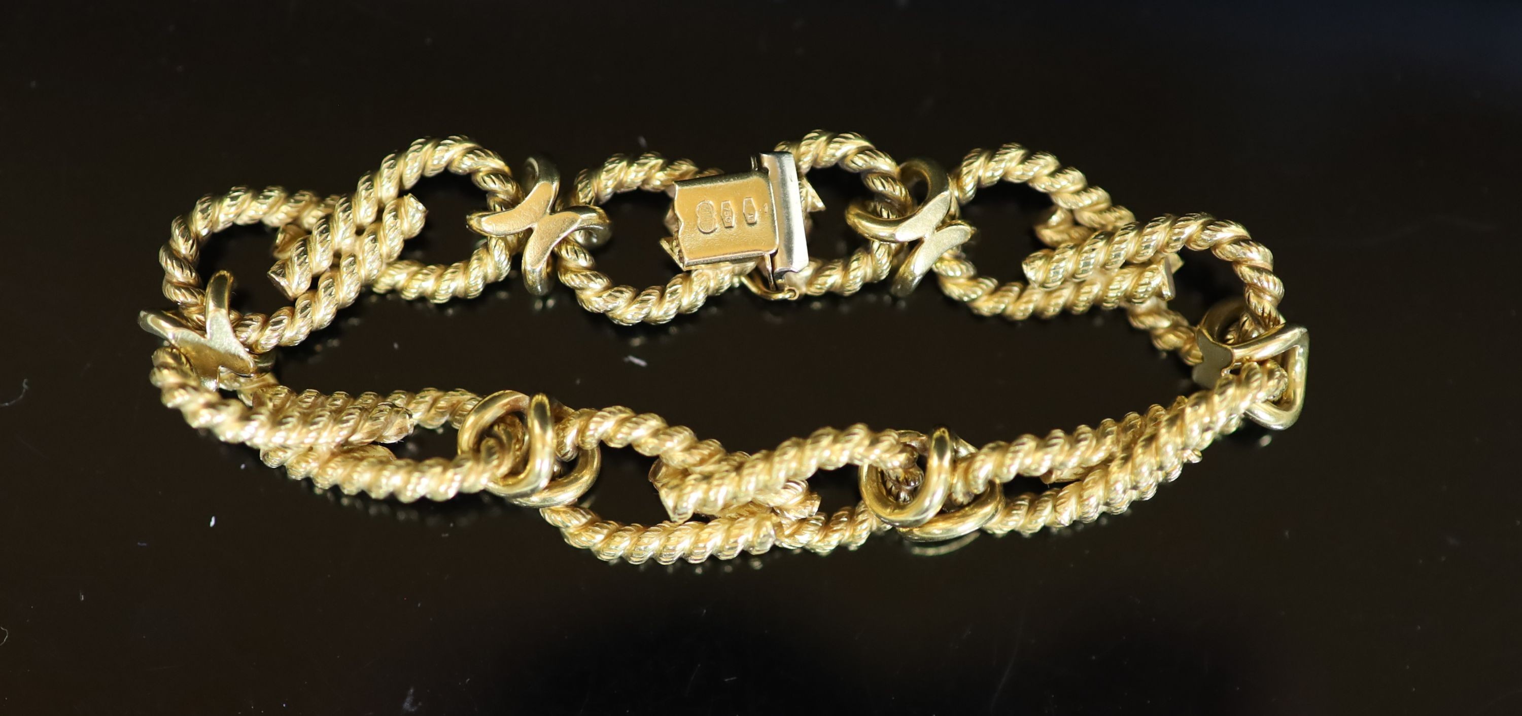 A modern Italian Uno-A-Erre 750 gold rope knot bracelet